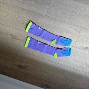 Purple and Green Knee-High Socks with Blue Accents